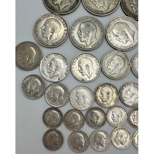 810 - A collection of mixed silver coinage to include George V : 6 x half crowns, 7 x florins, 10 x shilli... 