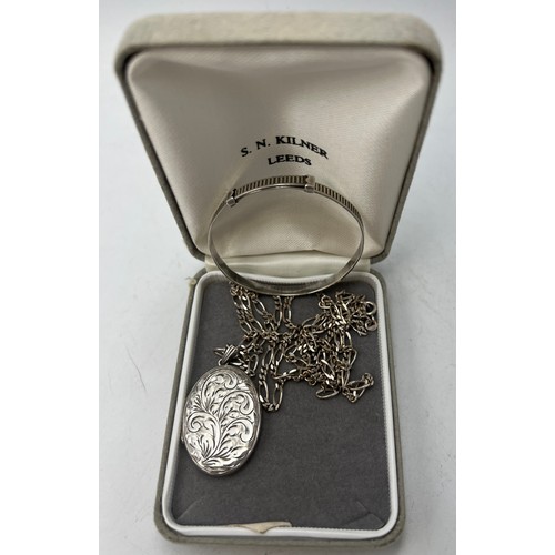 880 - Hallmarked silver to include a locket, Birmingham 1978 maker H G & S, a silver chain, marks indistin... 