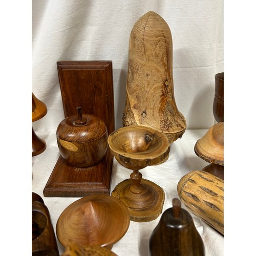 1373 - A collection of 20thC treen items to include toadstools, pears, apples, acorn, squirrel, hearts, lid... 