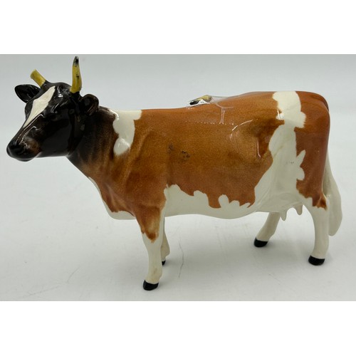 353 - Beswick Highland cattle bull, cow and calf together with CH Ickham Bessie 198 (4) .