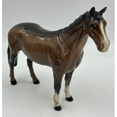 355 - A collection of Beswick horses and foals to include two Palominos. Tallest 21cm. (8)