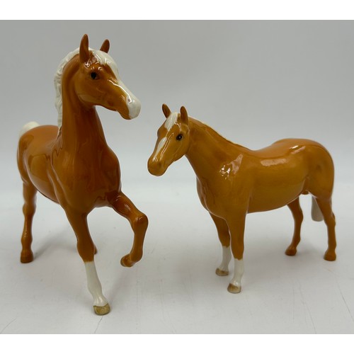 355 - A collection of Beswick horses and foals to include two Palominos. Tallest 21cm. (8)