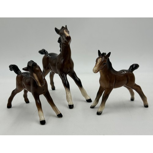 355 - A collection of Beswick horses and foals to include two Palominos. Tallest 21cm. (8)