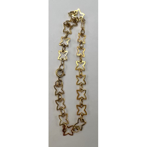 677 - A 9 carat gold star bracelet. Weight 2.4gm.