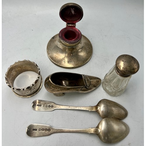 891 - Hallmarked silver to include capstan inkwell, pair teaspoons, napkin ring, shoe, silver topped glass... 