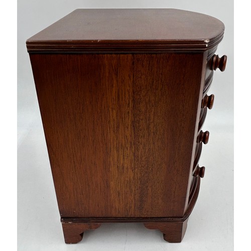 1066 - A miniature bow fronted mahogany jewellery chest with 4 drawers 23.5cm x 14cm to include an Italian ... 