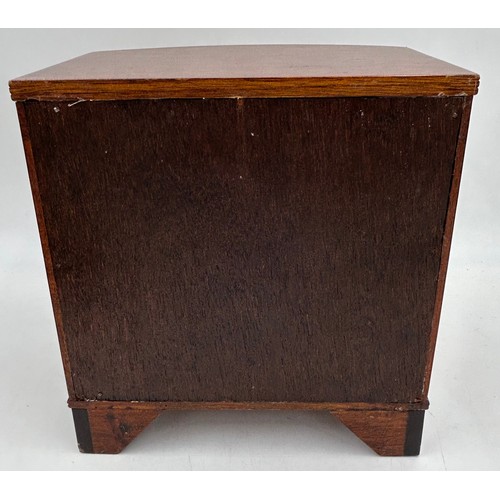 1066 - A miniature bow fronted mahogany jewellery chest with 4 drawers 23.5cm x 14cm to include an Italian ... 