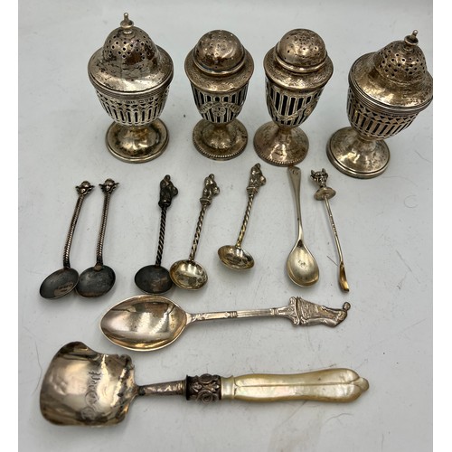 887 - Four hallmarked silver pepperette, Chester 1910 maker Stokes & Ireland Ltd and Chester 1913, maker G... 