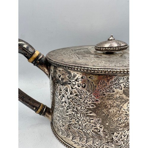 890 - A Victorian silver teapot, London 1883, maker Holland, Son & Slater.  Weight 638gm.