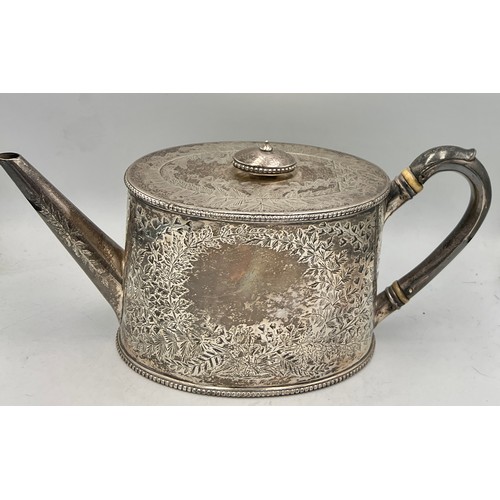 890 - A Victorian silver teapot, London 1883, maker Holland, Son & Slater.  Weight 638gm.