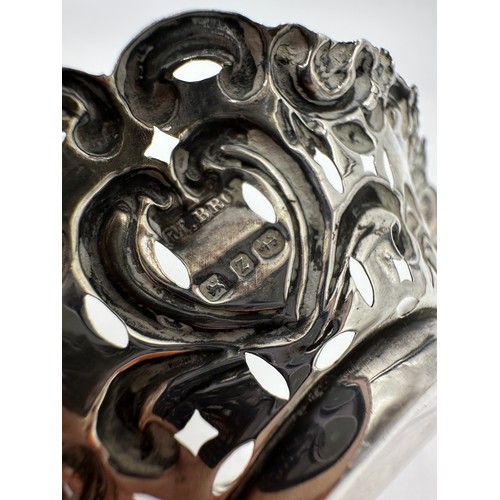 893 - A pair of hallmarked silver bon bon dishes, heart shaped with scrolls and  bows and pierced bodies. ... 