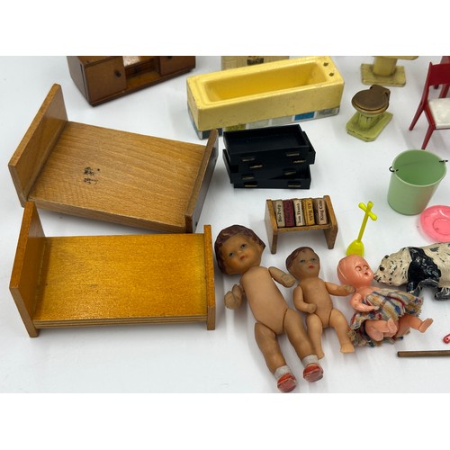 1293 - Various vintage toys to include a selection of dolls house furniture comprising of bedroom and kitch... 