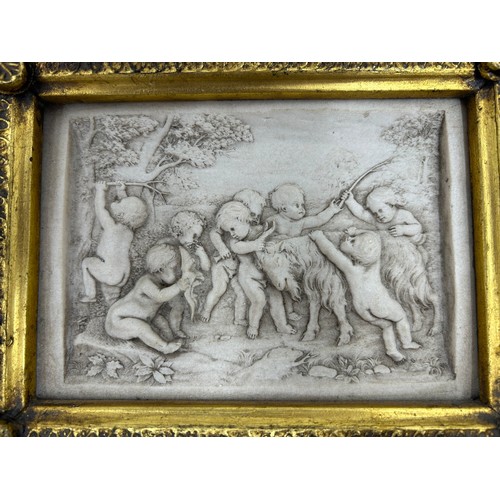 1528 - A pair of carved marble panels depicting neoclassical scenes one signed G. Andreoni 1875 in gilt flo... 