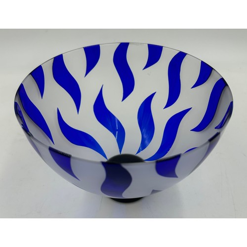 488 - Gillies Jones of Rosedale glass bowl decorated with cobalt blue wave design on a short black taperin... 