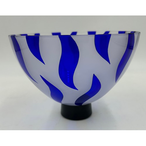 488 - Gillies Jones of Rosedale glass bowl decorated with cobalt blue wave design on a short black taperin... 