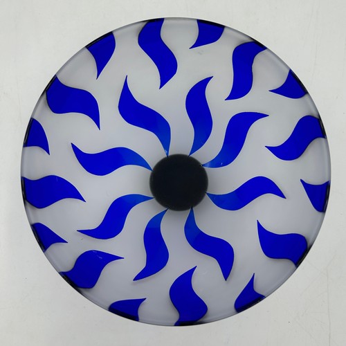 488 - Gillies Jones of Rosedale glass bowl decorated with cobalt blue wave design on a short black taperin... 