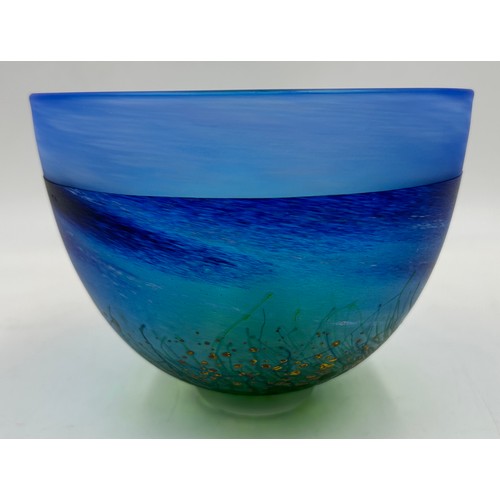 491 - A Malcolm Sutcliffe studio glass vase of seascape and dune meadow. Approx. 13cm h x 16.5cm diameter.