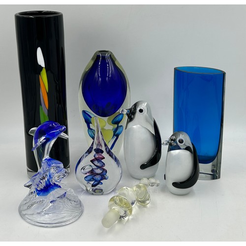 493 - Various continental glass to include two Svaja penguins, a black cylindrical vase with indistinct si... 