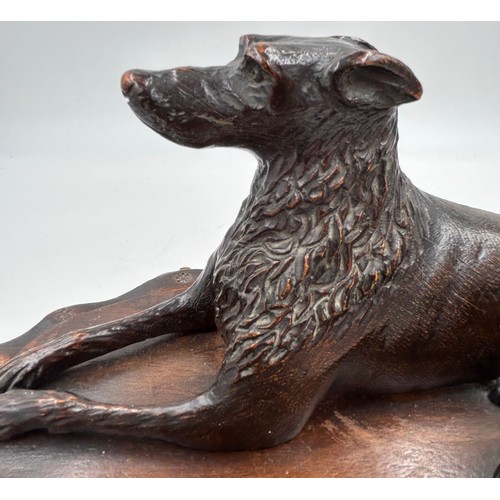 1333 - Three wooden carved items comprising a dog inkwell 20cm h, base 27.5 x 16.5cm, an Oriental figure ca... 