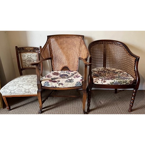 73 - Two caned back armchairs and an inlaid rosewood nursing chair.  Caned back chairs 80, 85cm h, nursin... 