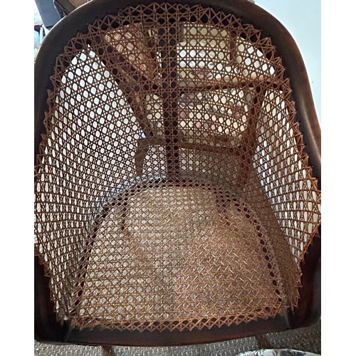 73 - Two caned back armchairs and an inlaid rosewood nursing chair.  Caned back chairs 80, 85cm h, nursin... 