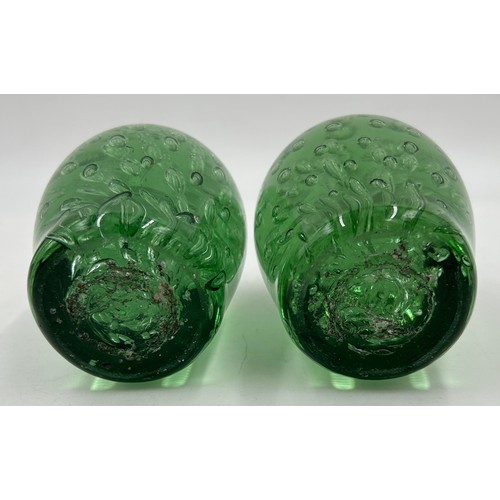 486 - A set of three Victorian glass dumps with bubble inclusions. Tallest 18cm, others 13cm.