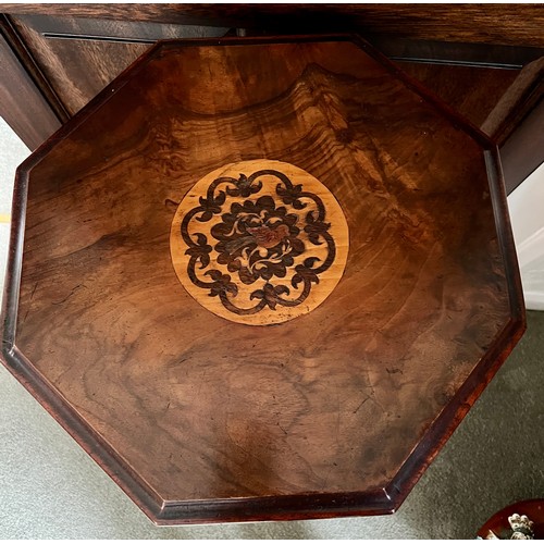 78 - A 19thC walnut work table with tripod base. 72cm h.