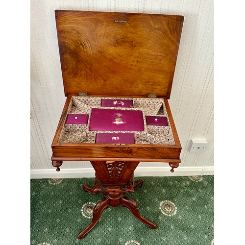 88 - A 19thC mahogany work table on quad base. 48cm w x 36cm d x 72cm h.