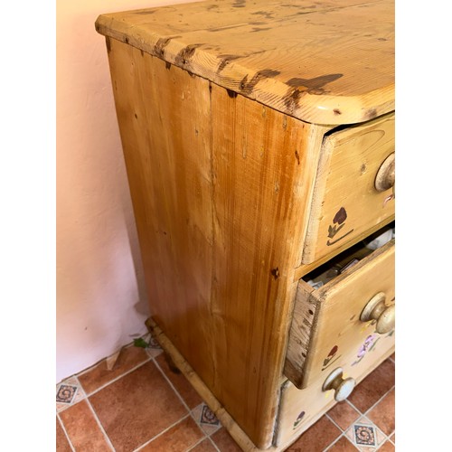 89 - A 19thC pine dresser with later painted decoration. 104cm w x 43cm d x 83cm h.