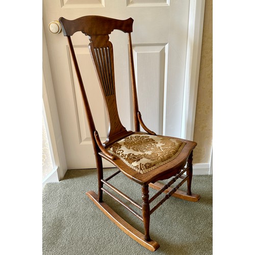 92 - A 19thC rosewood table 67cm h together with a rocking chair, height to seat 35cm.