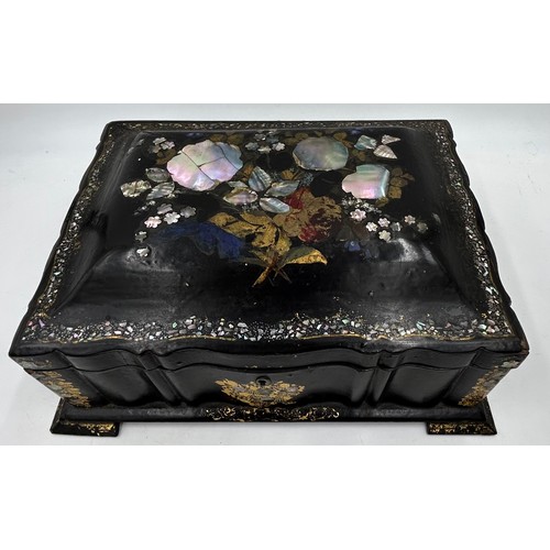 1386 - Two boxes : a papier-mâché sewing/jewellery box with gilt and mother of pearl embellishment raised o... 