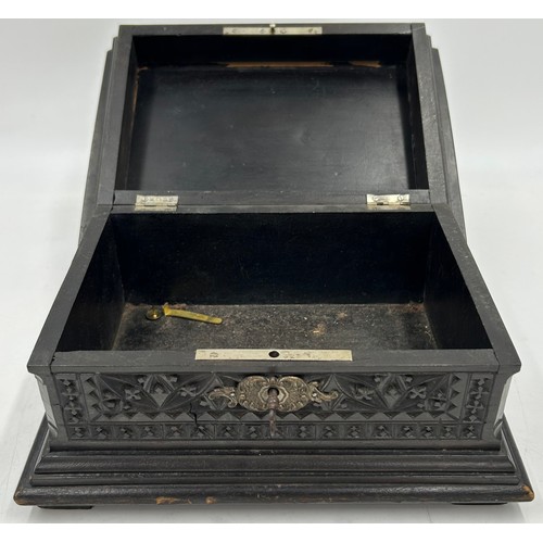 1386 - Two boxes : a papier-mâché sewing/jewellery box with gilt and mother of pearl embellishment raised o... 