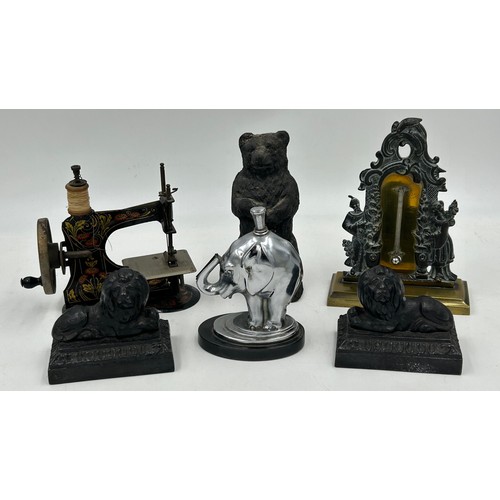 1390 - Metal items to include 19thC ornate brass desktop thermometer 18cm h, a cast iron bear, a pair of re... 