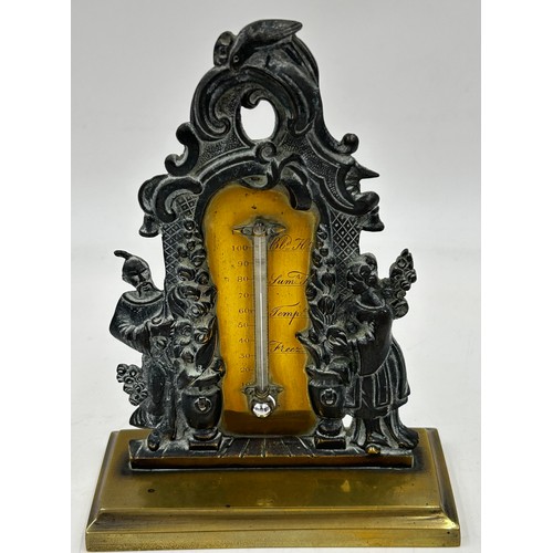 1390 - Metal items to include 19thC ornate brass desktop thermometer 18cm h, a cast iron bear, a pair of re... 