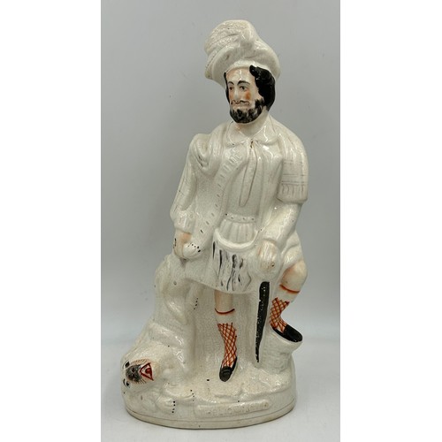 372 - A collection of Staffordshire figures to include The Lion Slayer 43cm, a couple under an arbour of v... 