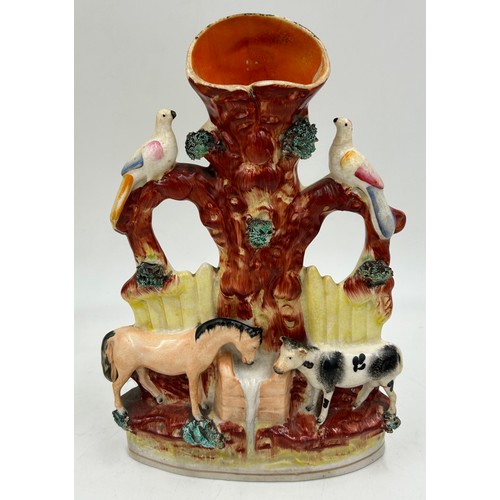 373 - Various Staffordshire figures. Tallest flat back with horse and cow 26cm.