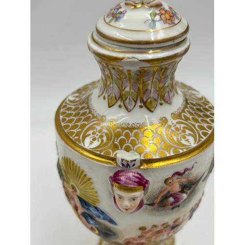 378 - Continental ceramics to include a Capodimonte urn shaped vase and cover with classical figures in re... 