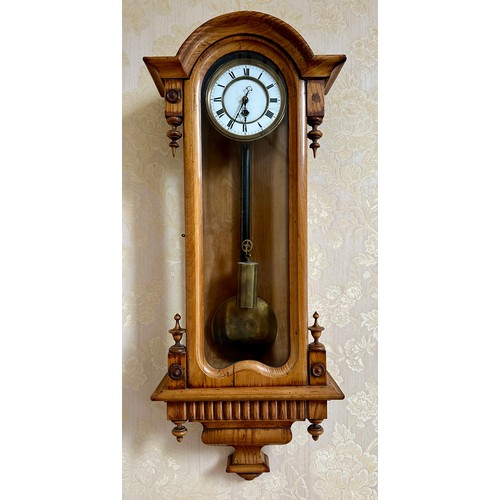 1121 - A 19thC single weight Vienna wall clock. 78cm h x 30cm w. Pendulum, weight and key.