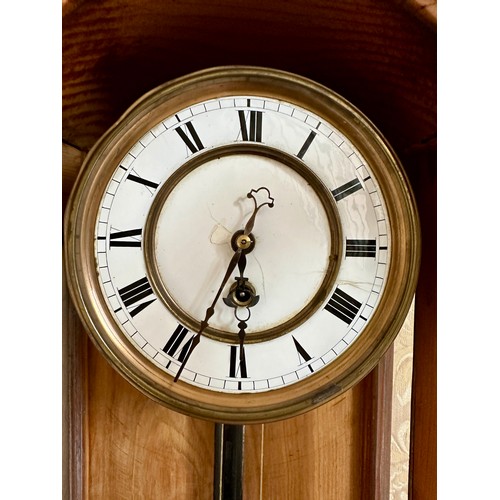 1121 - A 19thC single weight Vienna wall clock. 78cm h x 30cm w. Pendulum, weight and key.