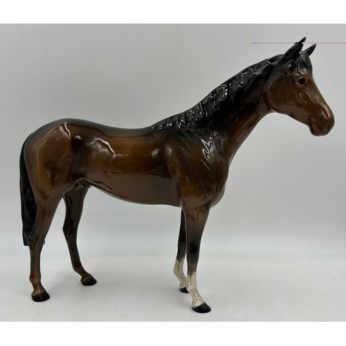 310 - Various Beswick to include a bay horse 29cm h, a foal, a fox, both with original green stickers, thr... 