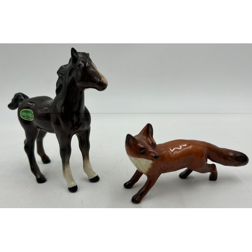 310 - Various Beswick to include a bay horse 29cm h, a foal, a fox, both with original green stickers, thr... 