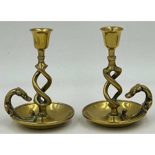 1077 - Brass items to include a pair of chambersticks with dog handles 13cm h, 2 pairs of trench art candle... 