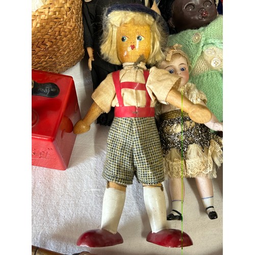 1316 - An assortment of vintage toys to include a 50's Steiff monkey with glass eyes, a clown thumb toy, a ... 