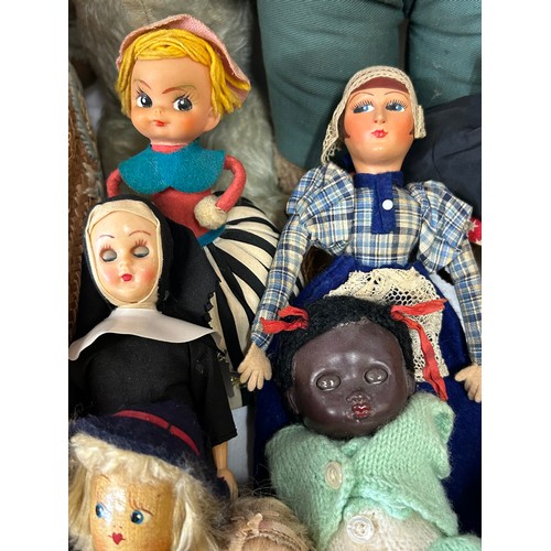 1316 - An assortment of vintage toys to include a 50's Steiff monkey with glass eyes, a clown thumb toy, a ... 