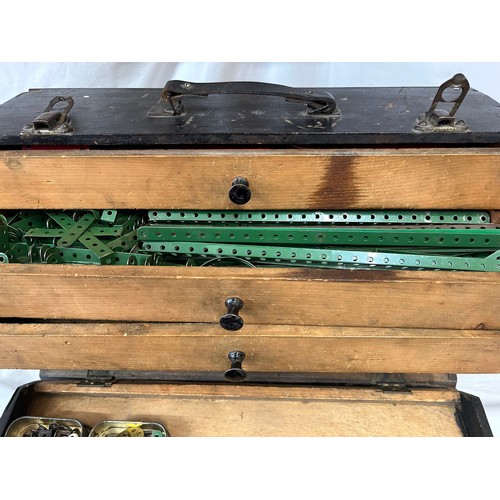 1318 - Collection of vintage Meccano housed in a wooden case with internal drawers. Case 51cm x 19cm x 35cm... 