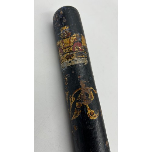 1337 - A Victorian police hardwood truncheon with painted Victorian Crown, lettering 'V R', and turned hand... 