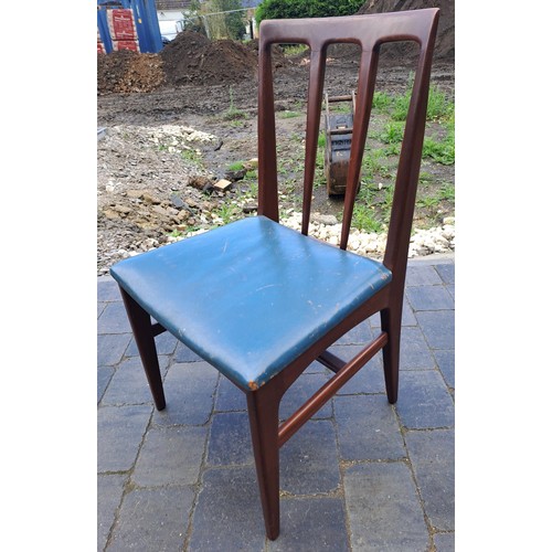 98 - A mid 20thC teak extending dining table and six chairs including two with arms. Table size open 69cm... 