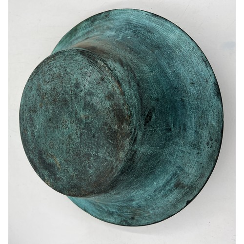 1006 - A twin handled metal bowl with decoration to interior. 40cm d.