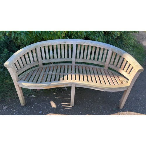 9 - Two serpentine fronted teak garden benches. 153cm w x 56cm d x 80cm h.