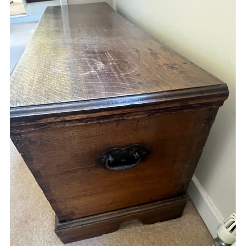 102 - A 19thC oak blanket box with candle box to interior. 128cm l x 40.5cm d x 49.5cm h.